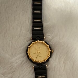Authentic Orion Women's Watch with Black Strap and Gold Details